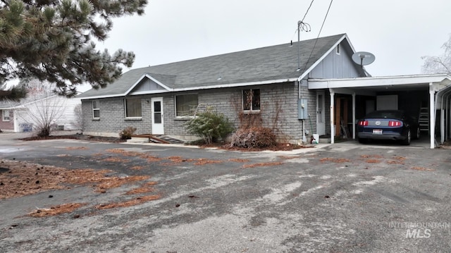 view of front of property with a carport