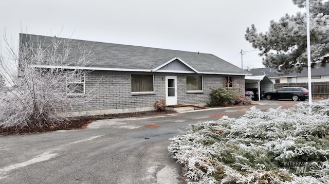 view of front of house featuring a carport