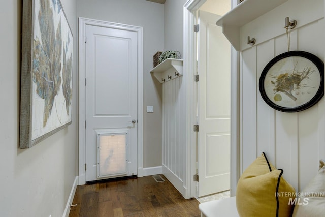 doorway featuring dark hardwood / wood-style flooring