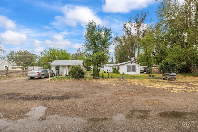 218 E Owyhee Ave, Homedale, ID 83628 - view of front facade with fence