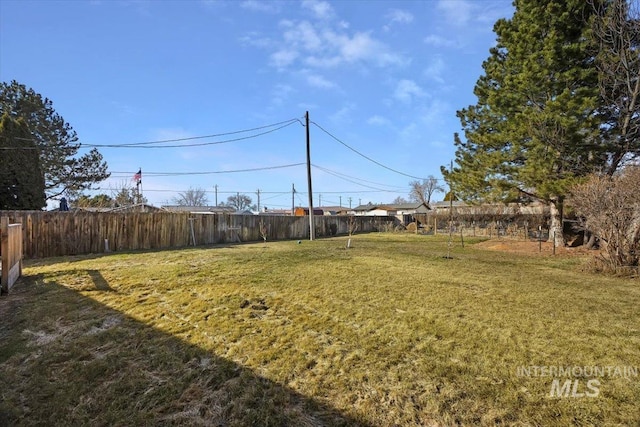 view of yard with fence