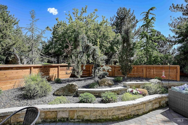 view of yard featuring fence