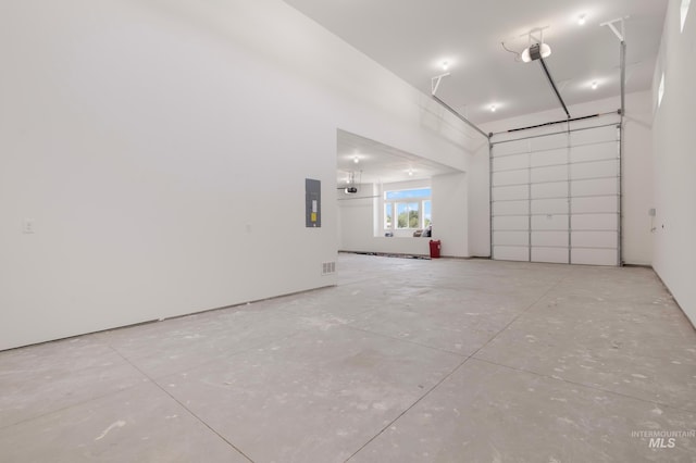 24910 Ardmore Ct, Caldwell, ID 83607 - garage featuring electric panel and a garage door opener