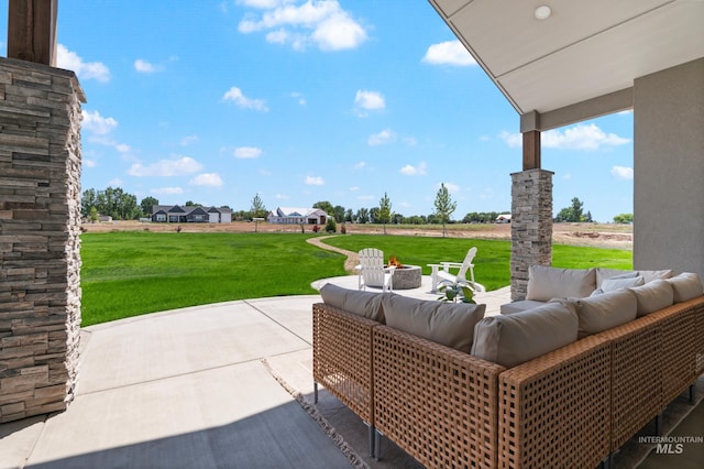 24910 Ardmore Ct, Caldwell, ID 83607 - view of patio / terrace with an outdoor living space with a fire pit
