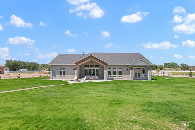 24910 Ardmore Ct, Caldwell, ID 83607 - back of house with french doors, a patio area, a lawn, outdoor lounge area, and stucco siding