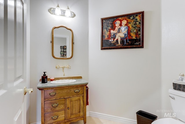 1795 W Black Canyon Hwy, Emmett, ID 83617 - half bathroom featuring vanity and toilet