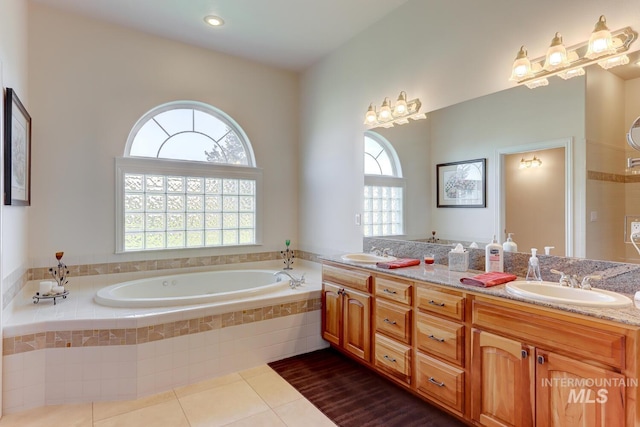 1795 W Black Canyon Hwy, Emmett, ID 83617 - full bath with double vanity, a sink, a bath, and tile patterned floors
