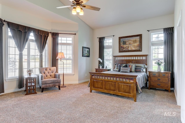 1795 W Black Canyon Hwy, Emmett, ID 83617 - carpeted bedroom featuring baseboards, ceiling fan, lofted ceiling, and multiple windows