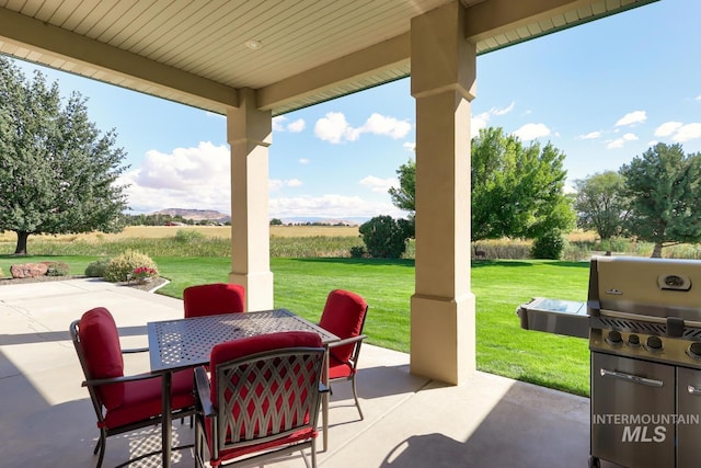1795 W Black Canyon Hwy, Emmett, ID 83617 - view of patio / terrace with a rural view and outdoor dining space