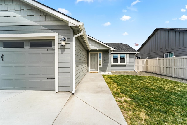 entrance to property with an attached garage
