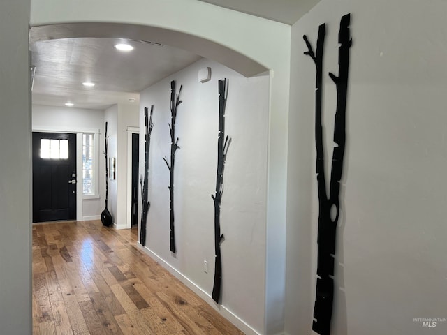 foyer entrance with light hardwood / wood-style flooring