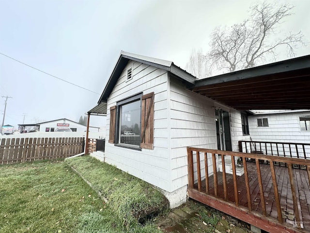 view of home's exterior with a yard