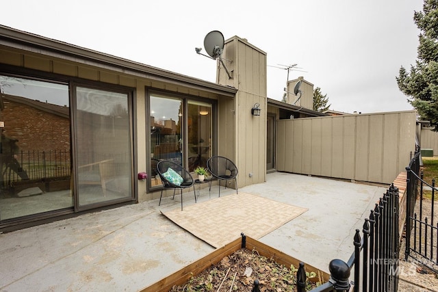 view of patio / terrace with fence