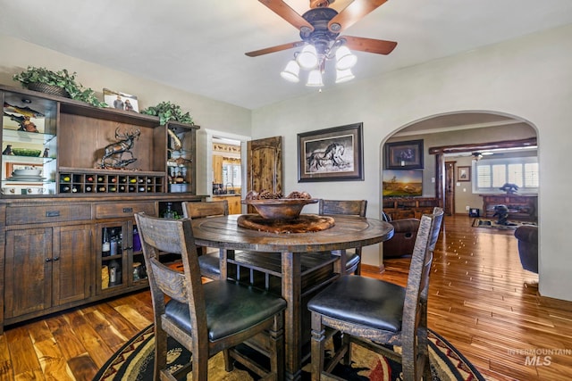 dining room featuring hardwood / wood-style flooring and ceiling fan