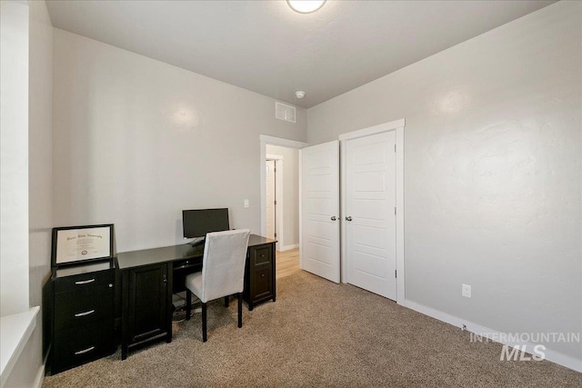 view of carpeted home office