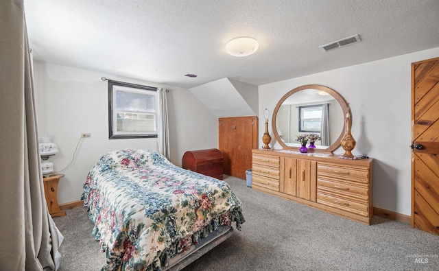 209 N Canyon St, Nampa, ID 83651 - bedroom featuring light carpet and a textured ceiling