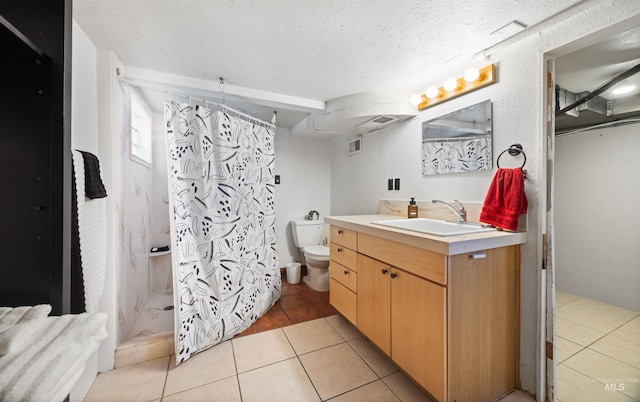 209 N Canyon St, Nampa, ID 83651 - bathroom with vanity, toilet, a shower with curtain, tile patterned floors, and a textured ceiling