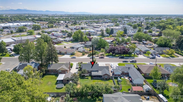 209 N Canyon St, Nampa, ID 83651 - aerial view of property's location with nearby suburban area and mountains