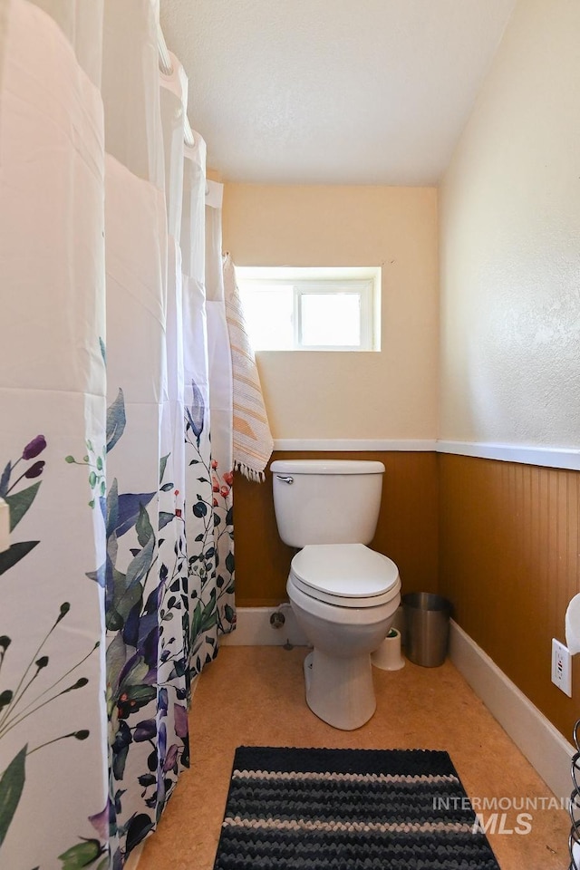 221 N Union St, Star, ID 83669 - bathroom featuring toilet and curtained shower