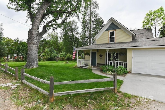 221 N Union St, Star, ID 83669 - view of front of house with covered porch, an attached garage, roof with shingles, and driveway