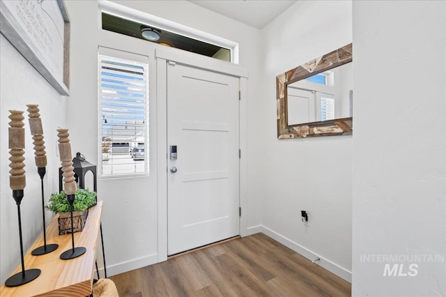1499 W Blue Downs St, Meridian, ID 83642 - foyer entrance with wood finished floors and baseboards
