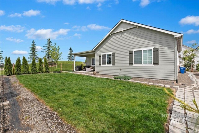 8291 W Corinthia St, Eagle, ID 83616 - back of house featuring a patio area