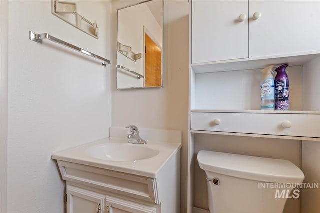 611 E Dewey Ln, Caldwell, ID 83607 - bathroom featuring vanity and toilet