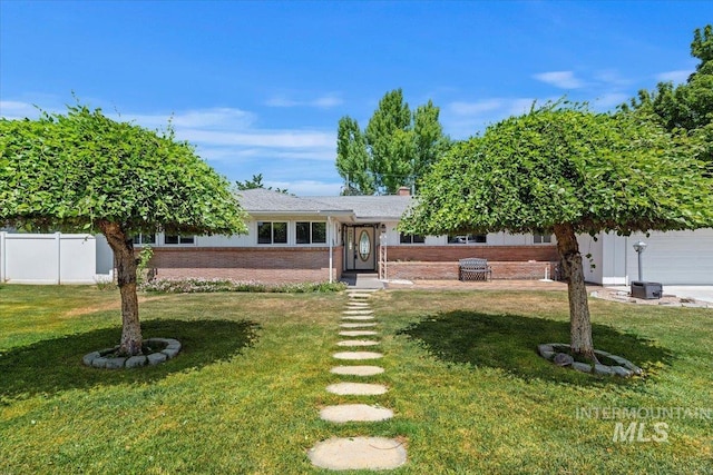 611 E Dewey Ln, Caldwell, ID 83607 - ranch-style house featuring brick siding