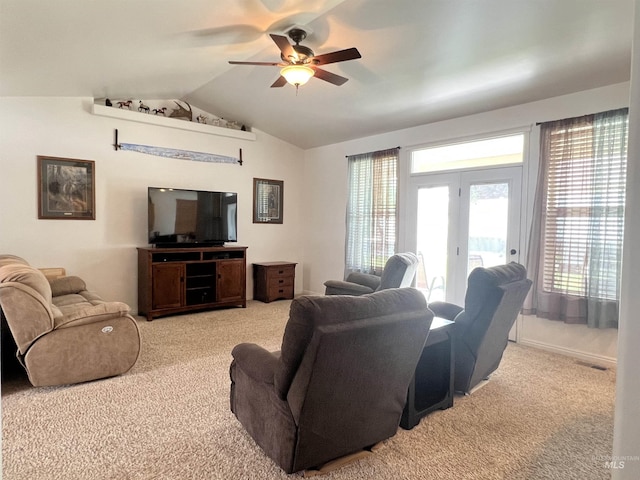 554 Valley Circle Rd, Hagerman, ID 83332 - living room featuring light colored carpet, vaulted ceiling, and ceiling fan