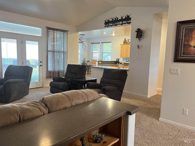 554 Valley Circle Rd, Hagerman, ID 83332 - living room with light carpet, vaulted ceiling, and baseboards