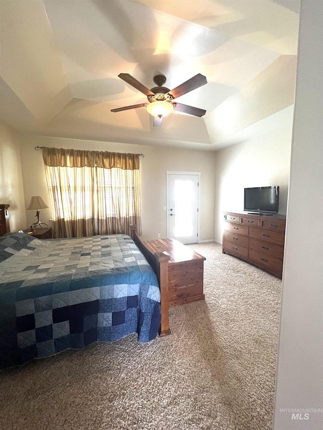 554 Valley Circle Rd, Hagerman, ID 83332 - carpeted bedroom with a tray ceiling and a ceiling fan