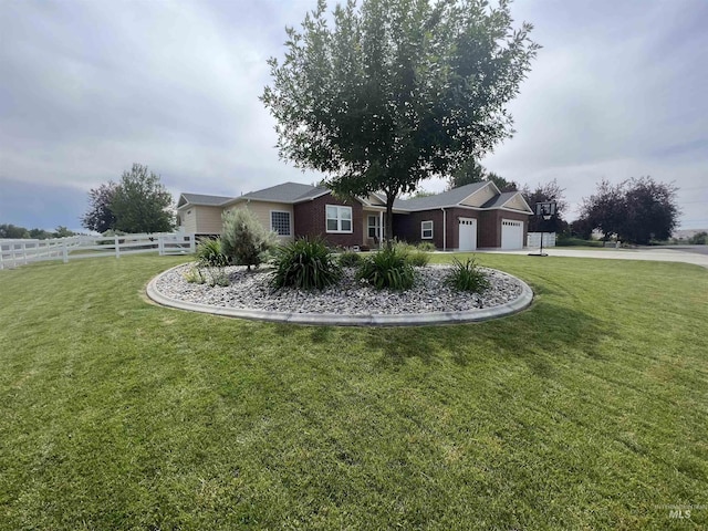 554 Valley Circle Rd, Hagerman, ID 83332 - view of property exterior with a garage, driveway, and brick siding