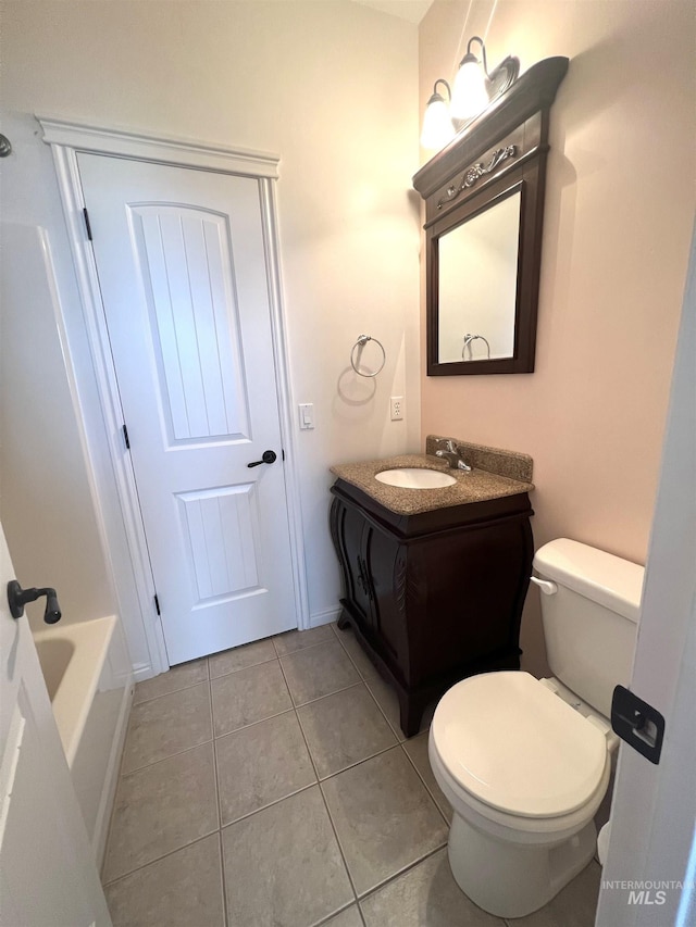 554 Valley Circle Rd, Hagerman, ID 83332 - full bathroom with vanity, tile patterned floors, and toilet