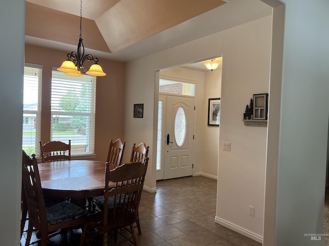 554 Valley Circle Rd, Hagerman, ID 83332 - tiled dining room with baseboards and lofted ceiling