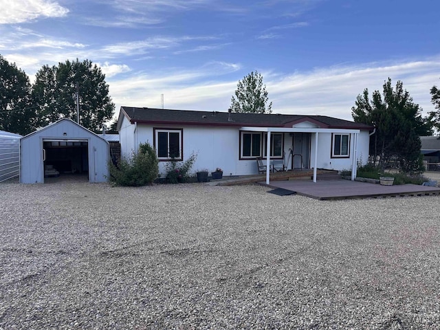 17121 Basey St, Murphy, ID 83650 - ranch-style home with an outdoor structure, a detached garage, and covered porch