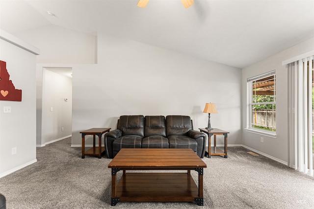 living area featuring carpet floors, baseboards, vaulted ceiling, and ceiling fan