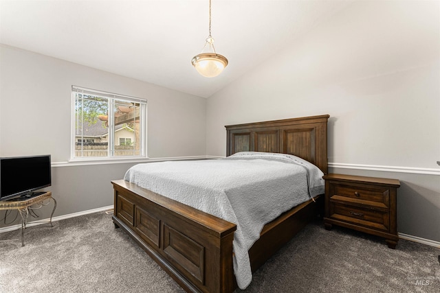 bedroom with baseboards, carpet, and vaulted ceiling