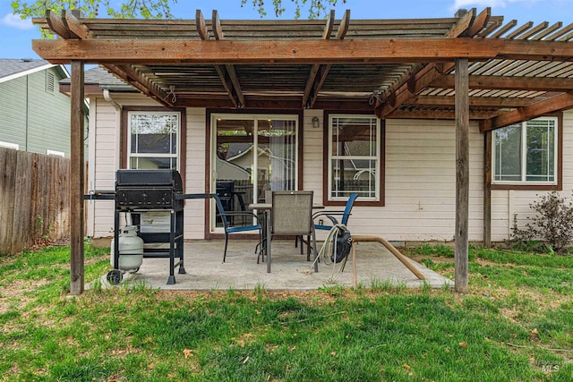 exterior space with a lawn, fence, a pergola, and a patio