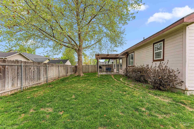 view of yard with a fenced backyard and a patio area