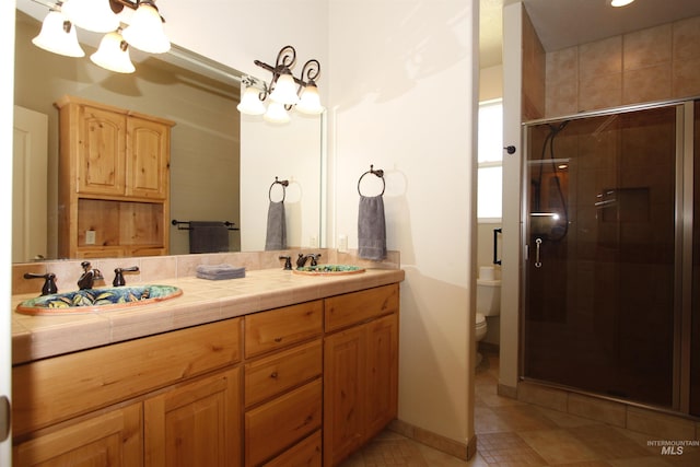 19801 Pinehaven Ln, Lenore, ID 83541 - full bath with a chandelier, double vanity, tile patterned floors, and a shower stall