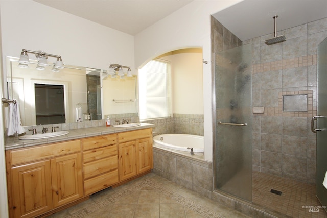 19801 Pinehaven Ln, Lenore, ID 83541 - full bath with tile patterned flooring, a shower stall, double vanity, and a bath