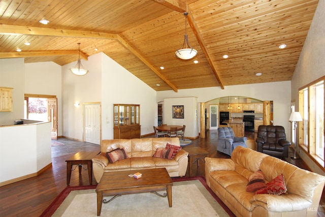 19801 Pinehaven Ln, Lenore, ID 83541 - living area featuring hardwood / wood-style floors, recessed lighting, plenty of natural light, arched walkways, and a wooden ceiling with exposed beams
