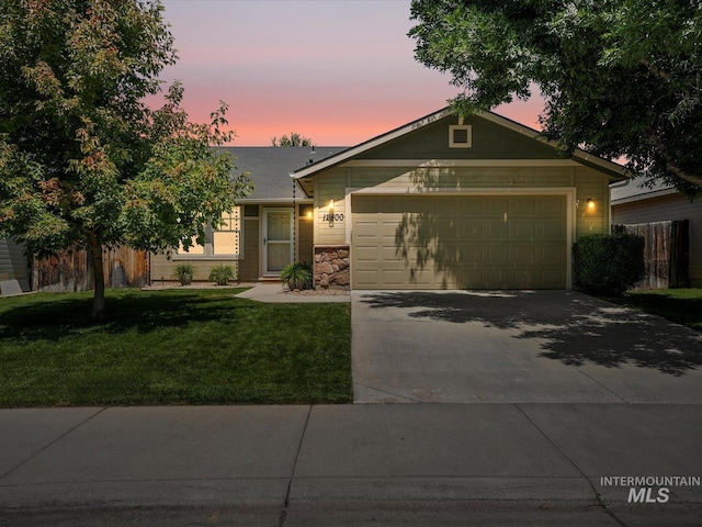 12800 W Fernleaf St, Boise, ID 83713 - single story home featuring concrete driveway, a front yard, an attached garage, and stone siding