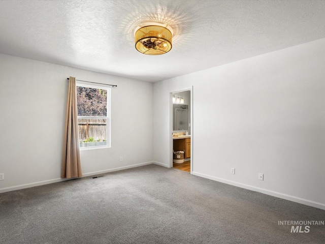 12800 W Fernleaf St, Boise, ID 83713 - carpeted spare room with a textured ceiling