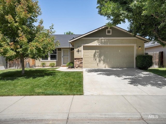 12800 W Fernleaf St, Boise, ID 83713 - ranch-style home with driveway, a front lawn, an attached garage, and stone siding