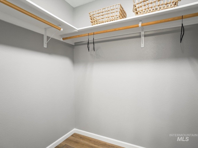 12800 W Fernleaf St, Boise, ID 83713 - walk in closet featuring wood finished floors
