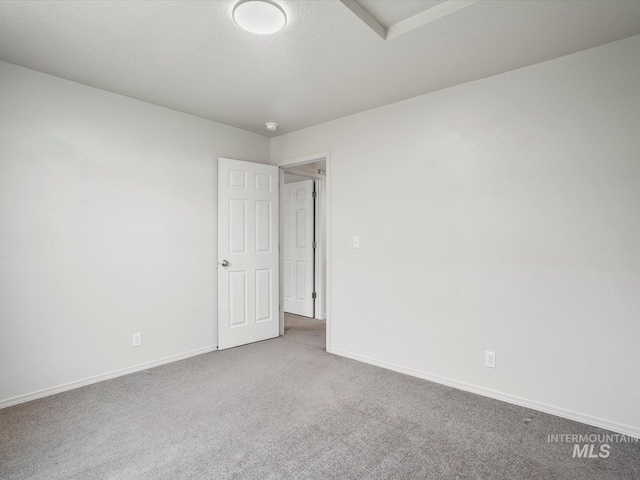 12800 W Fernleaf St, Boise, ID 83713 - carpeted empty room featuring baseboards