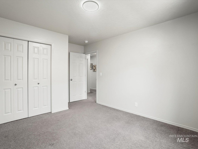 12800 W Fernleaf St, Boise, ID 83713 - unfurnished bedroom with carpet floors and a closet