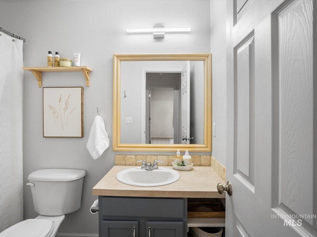 12800 W Fernleaf St, Boise, ID 83713 - bathroom featuring vanity and toilet