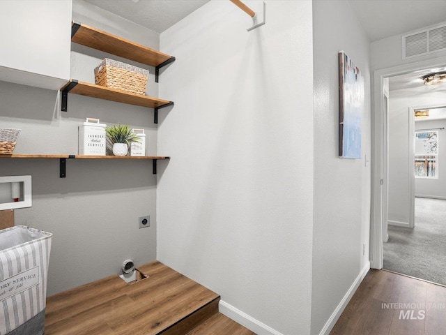 12800 W Fernleaf St, Boise, ID 83713 - laundry room featuring hookup for an electric dryer, washer hookup, and wood finished floors